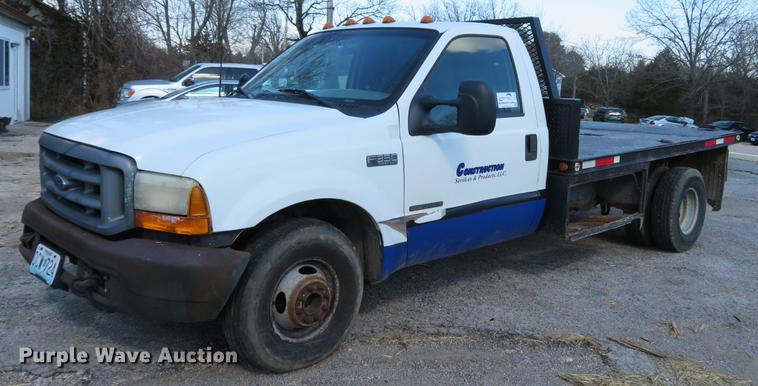 image for item DG3913 2000 Ford F350 Super Duty XL flatbed pickup truck
