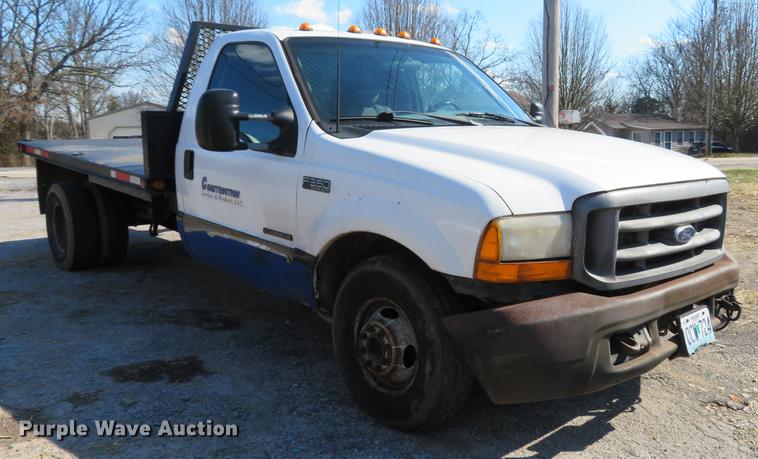 image for item DG3913 2000 Ford F350 Super Duty XL flatbed pickup truck
