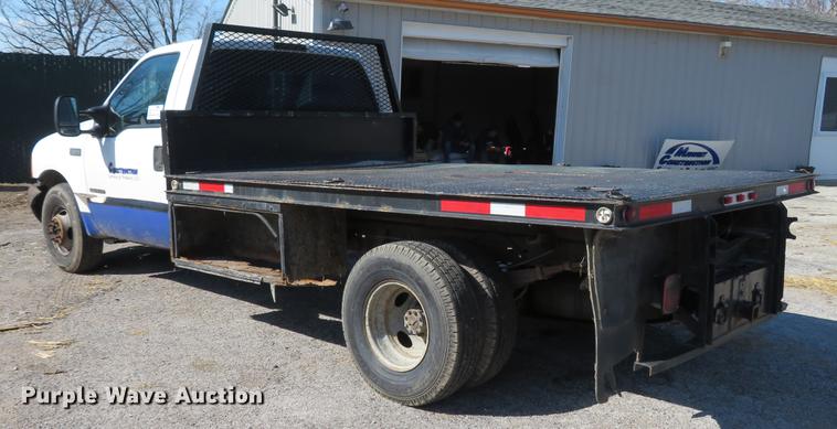 image for item DG3913 2000 Ford F350 Super Duty XL flatbed pickup truck