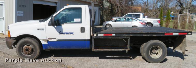 image for item DG3913 2000 Ford F350 Super Duty XL flatbed pickup truck
