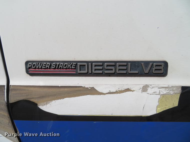 image for item DG3913 2000 Ford F350 Super Duty XL flatbed pickup truck