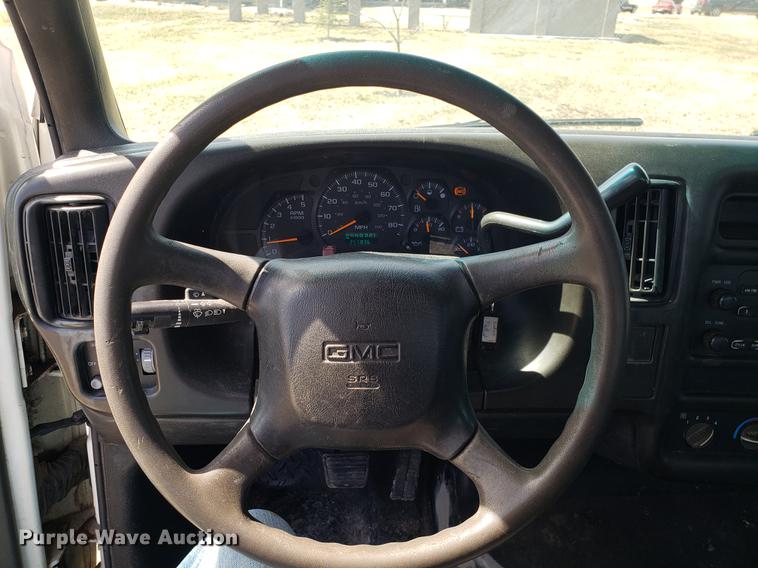 image for item EN9818 2003 GMC C4500 flatbed truck