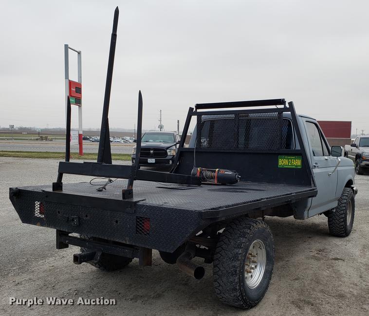 image for item EN9837 1988 Ford F250 flatbed pickup truck