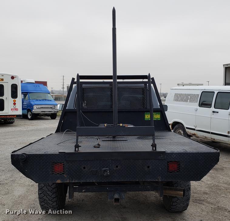 image for item EN9837 1988 Ford F250 flatbed pickup truck