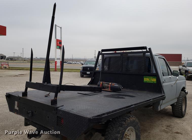 image for item EN9837 1988 Ford F250 flatbed pickup truck