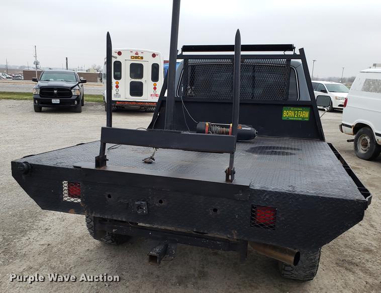 image for item EN9837 1988 Ford F250 flatbed pickup truck