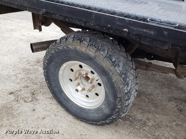 image for item EN9837 1988 Ford F250 flatbed pickup truck