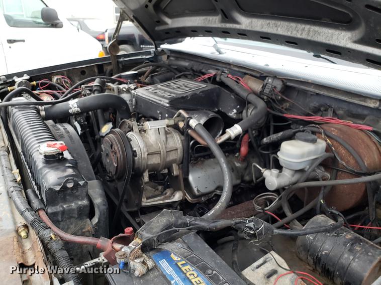 image for item EN9837 1988 Ford F250 flatbed pickup truck