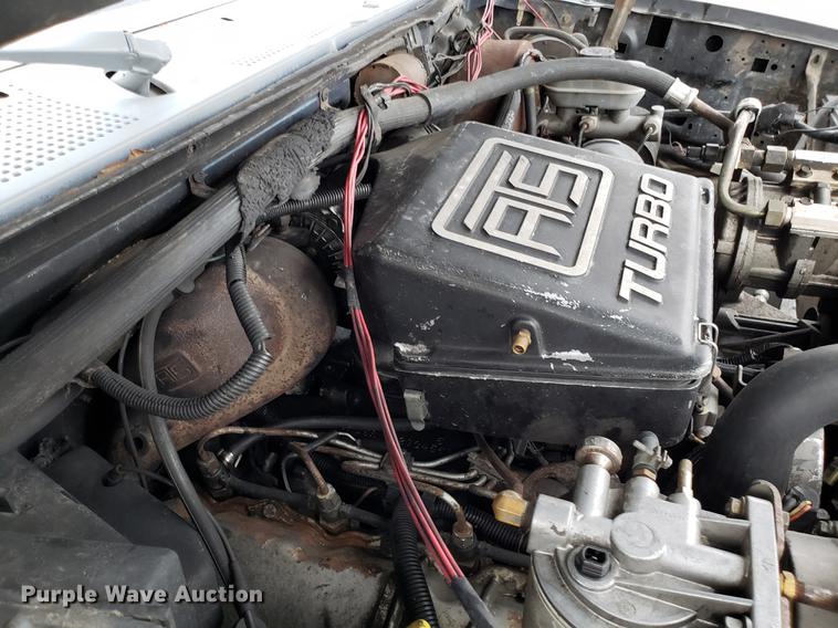 image for item EN9837 1988 Ford F250 flatbed pickup truck