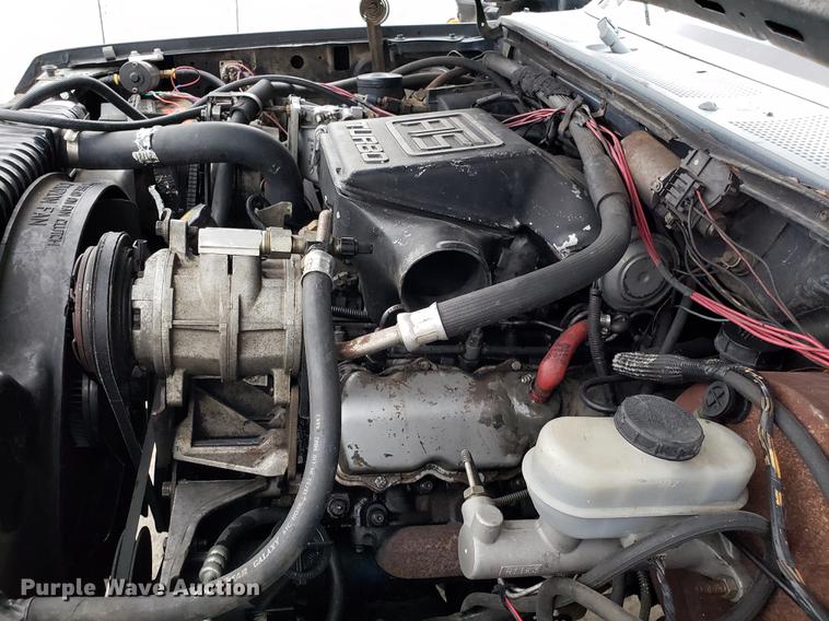 image for item EN9837 1988 Ford F250 flatbed pickup truck