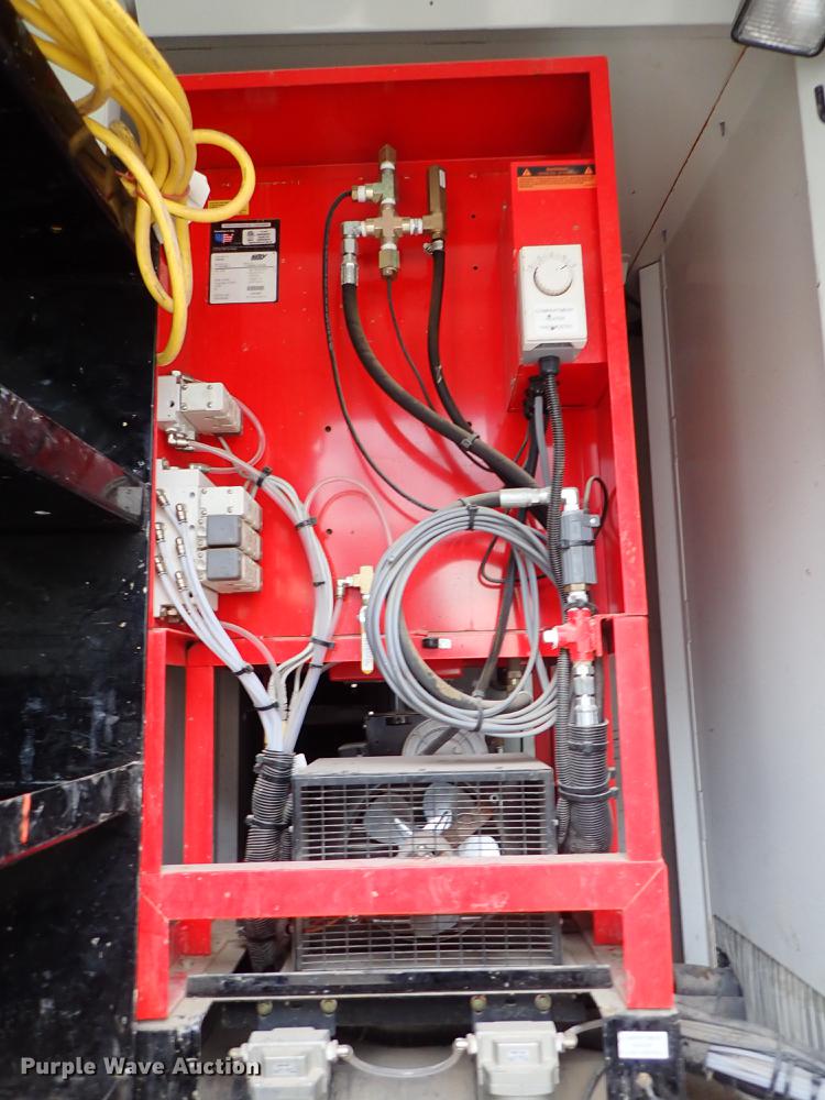 image for item DC1350 2012 Volvo VHD hydrovac truck