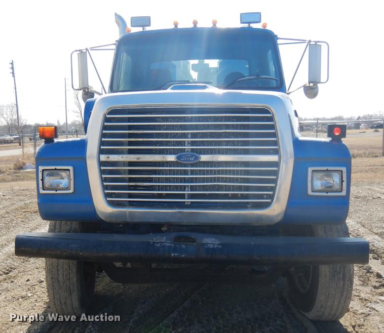 image for item DD3616 1996 Ford LT9000 flatbed water truck