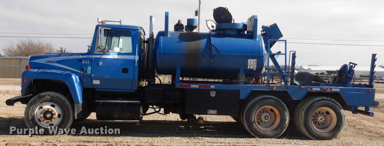 image for item DD3616 1996 Ford LT9000 flatbed water truck