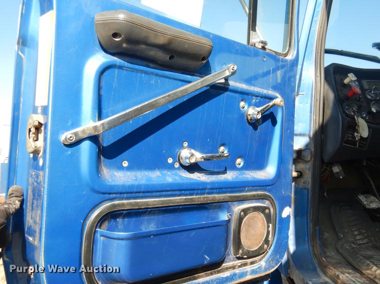 image for item DD3616 1996 Ford LT9000 flatbed water truck