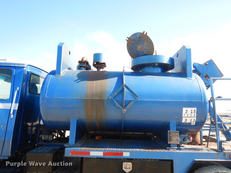 image for item DD3616 1996 Ford LT9000 flatbed water truck