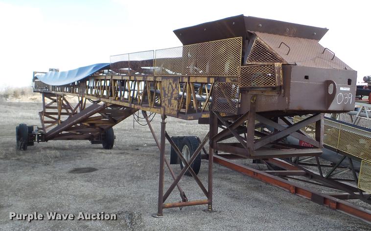 image for item EJ9027 Kolman 24X70 stacking conveyor