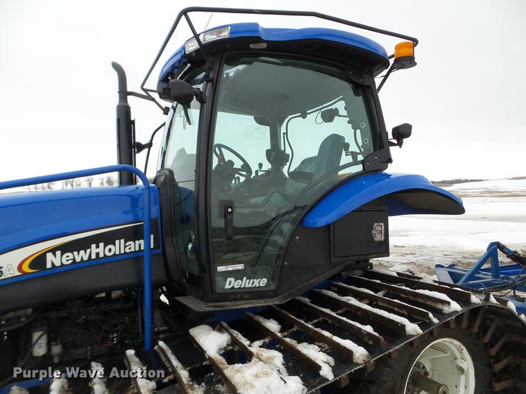 image for item EW9993 2005 New Holland TS115A tractor with snow groomer