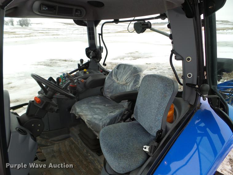 image for item EW9993 2005 New Holland TS115A tractor with snow groomer