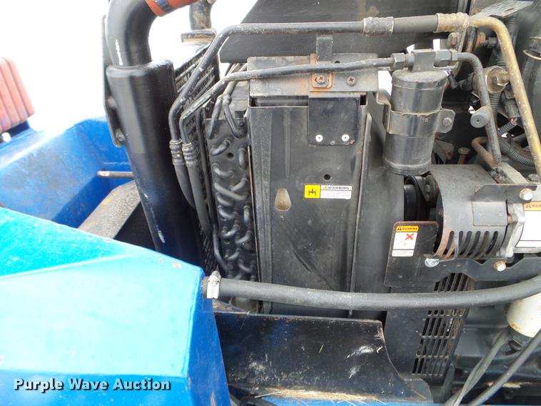 image for item EW9993 2005 New Holland TS115A tractor with snow groomer