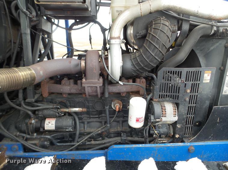 image for item EW9993 2005 New Holland TS115A tractor with snow groomer