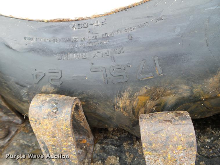 image for item EW9993 2005 New Holland TS115A tractor with snow groomer