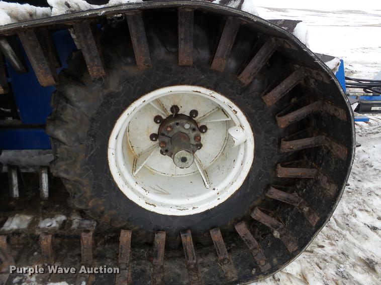 image for item EW9993 2005 New Holland TS115A tractor with snow groomer