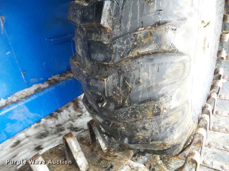 image for item EW9993 2005 New Holland TS115A tractor with snow groomer