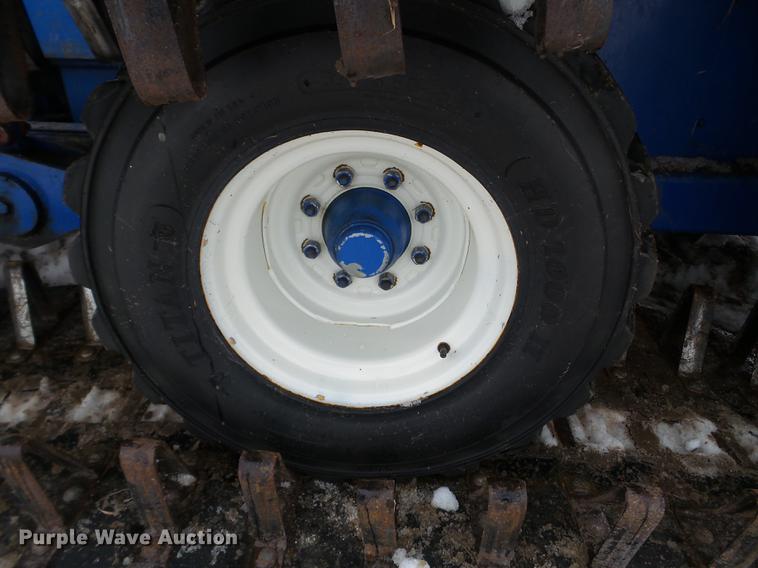 image for item EW9993 2005 New Holland TS115A tractor with snow groomer