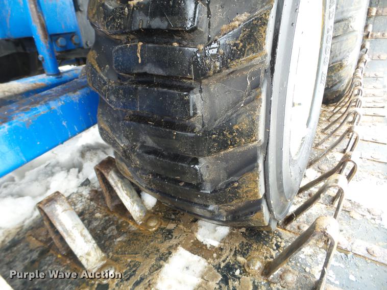 image for item EW9993 2005 New Holland TS115A tractor with snow groomer