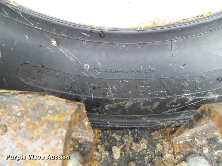 image for item EW9993 2005 New Holland TS115A tractor with snow groomer