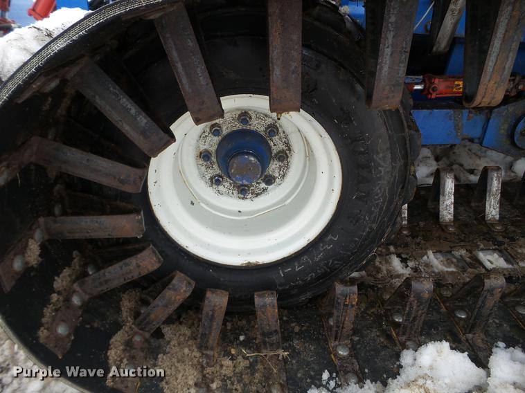 image for item EW9993 2005 New Holland TS115A tractor with snow groomer