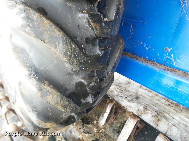 image for item EW9993 2005 New Holland TS115A tractor with snow groomer