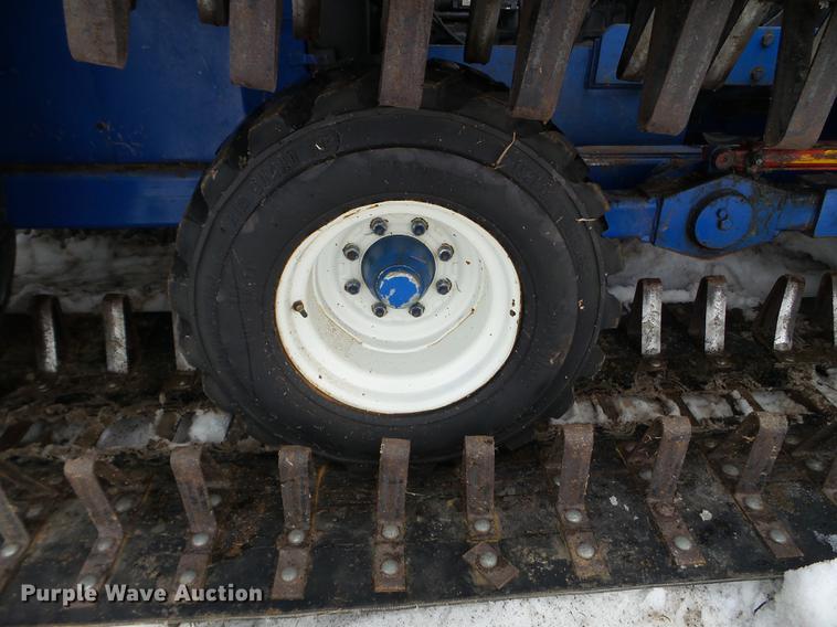 image for item EW9993 2005 New Holland TS115A tractor with snow groomer