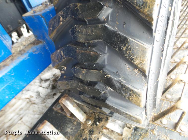 image for item EW9993 2005 New Holland TS115A tractor with snow groomer