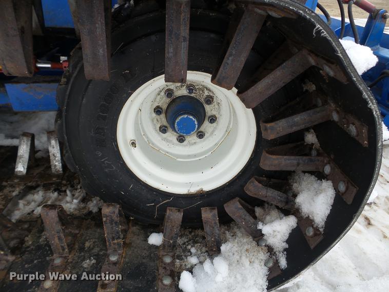 image for item EW9993 2005 New Holland TS115A tractor with snow groomer