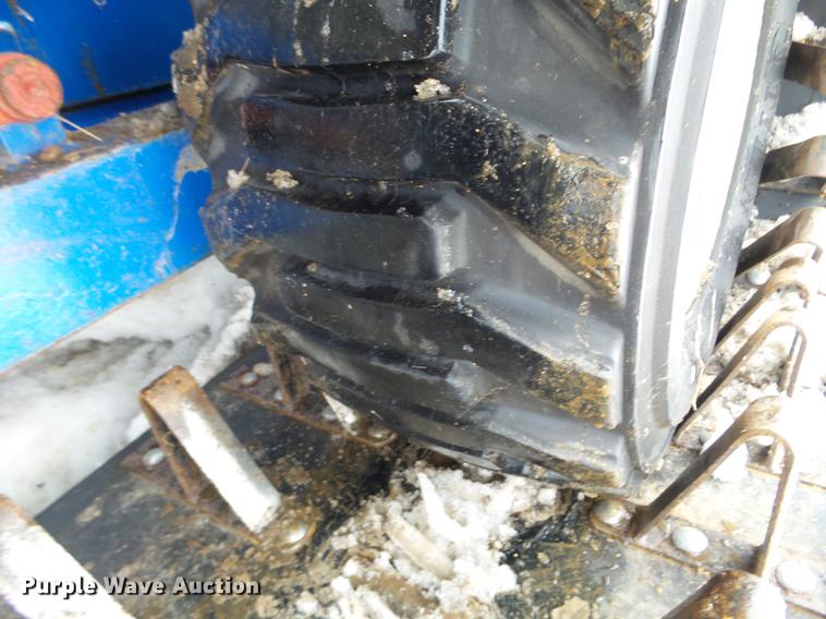 image for item EW9993 2005 New Holland TS115A tractor with snow groomer