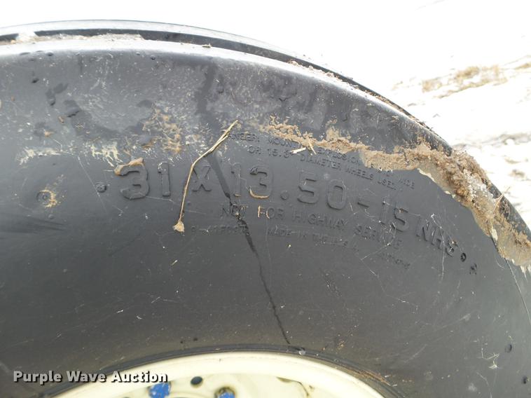 image for item EW9993 2005 New Holland TS115A tractor with snow groomer