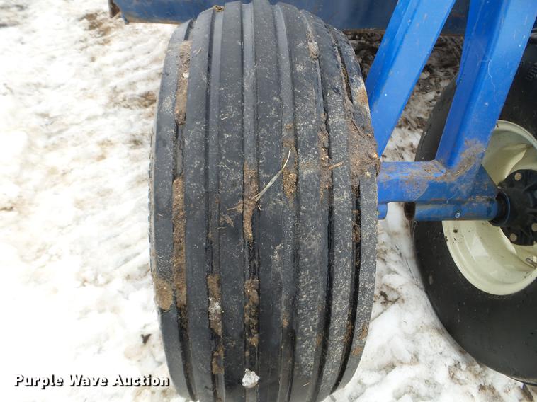 image for item EW9993 2005 New Holland TS115A tractor with snow groomer