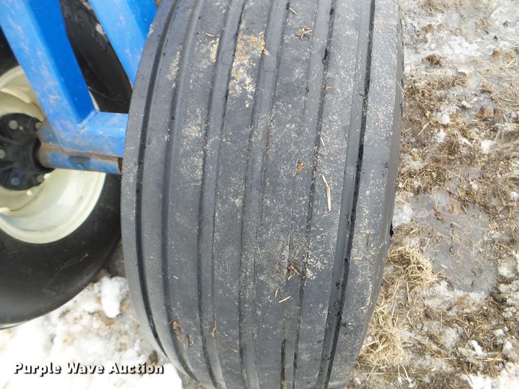 image for item EW9993 2005 New Holland TS115A tractor with snow groomer