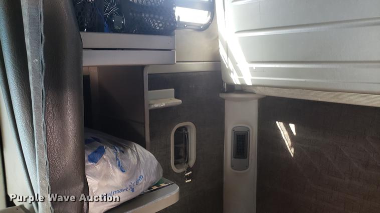 image for item EN9876 2004 Freightliner Century Class ST120 semi truck