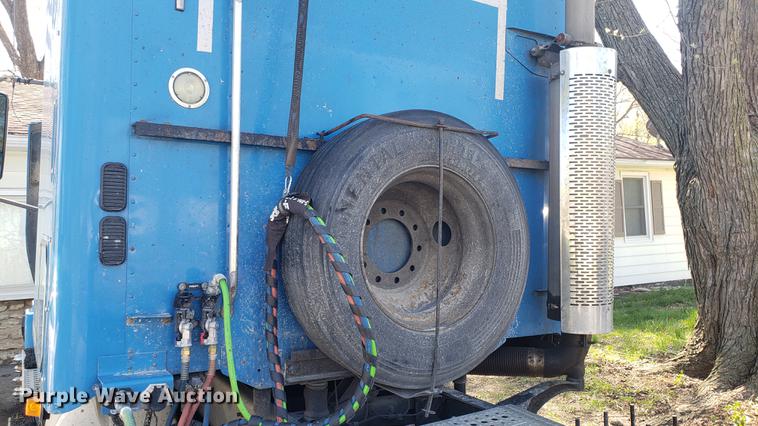 image for item EN9876 2004 Freightliner Century Class ST120 semi truck