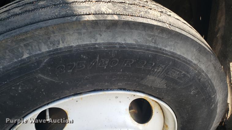 image for item EN9876 2004 Freightliner Century Class ST120 semi truck