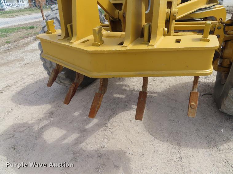 image for item DN9036 2004 John Deere 670CH motor grader