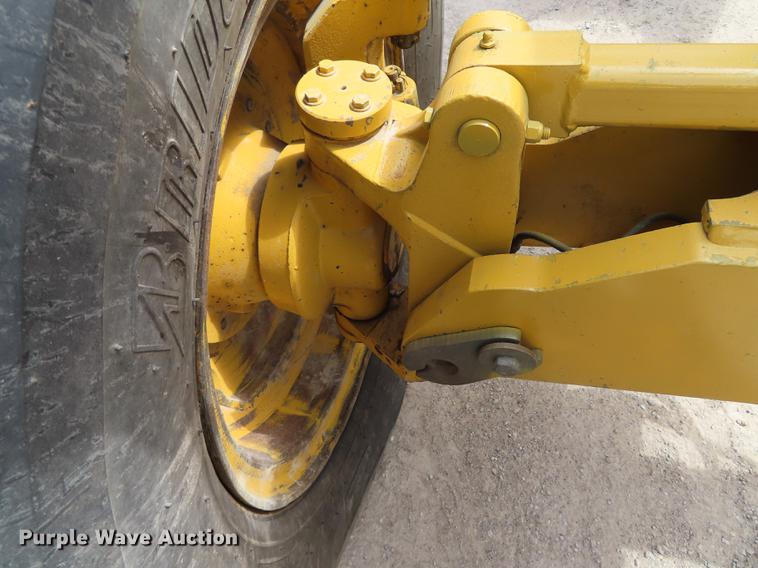 image for item DN9036 2004 John Deere 670CH motor grader