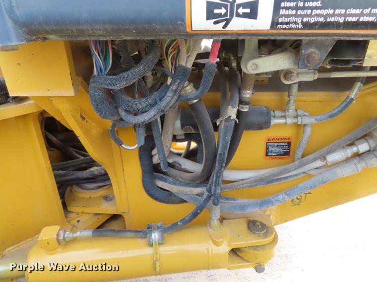 image for item DN9036 2004 John Deere 670CH motor grader