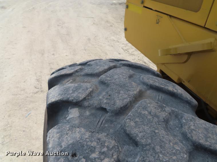 image for item DN9036 2004 John Deere 670CH motor grader