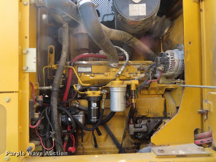 image for item DN9036 2004 John Deere 670CH motor grader