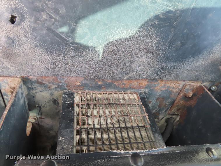 image for item DN9036 2004 John Deere 670CH motor grader