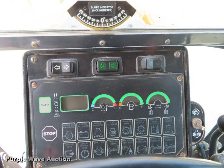 image for item DN9036 2004 John Deere 670CH motor grader