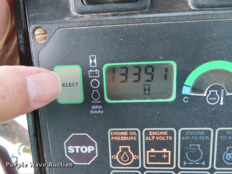 image for item DN9036 2004 John Deere 670CH motor grader